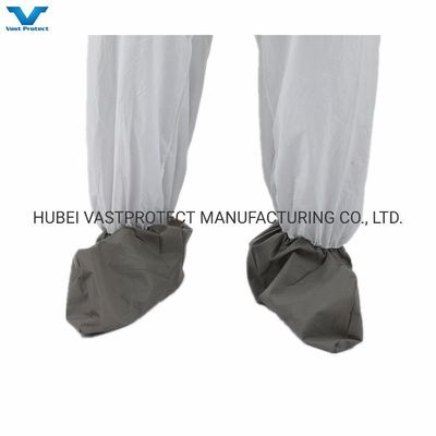 Equipamento de protecção individual de segurança industrial de tecido não tecido, maillots microporosos descartáveis com cobertura antiderrapante de botas cinza